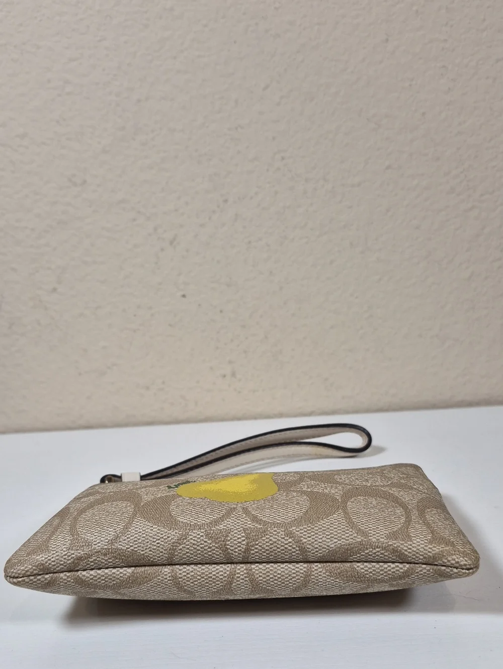 Coach Corner Zip Wristlet In Signature Canvas With Pear